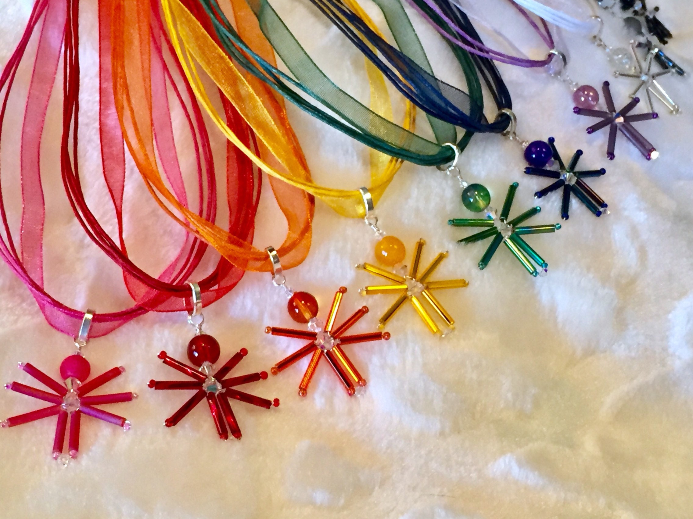 festive. Special Olympics earrings necklace jewelry Pink Red Orange Yellow Green Blue Purple Gray Black Silver Czech glass Swarovski crystal