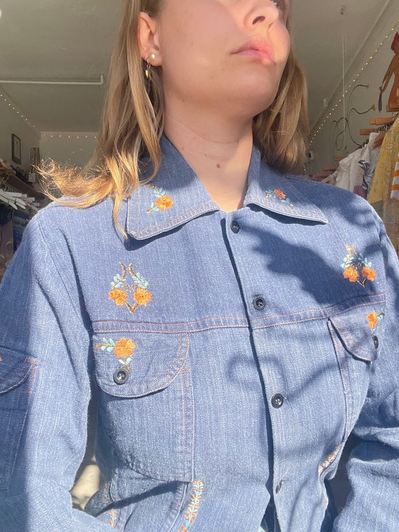 1970s blue denim jacket with multicolored floral … - image 1