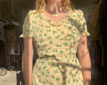 1960s yellow and green floral maxi dress with ruffles and lace trim