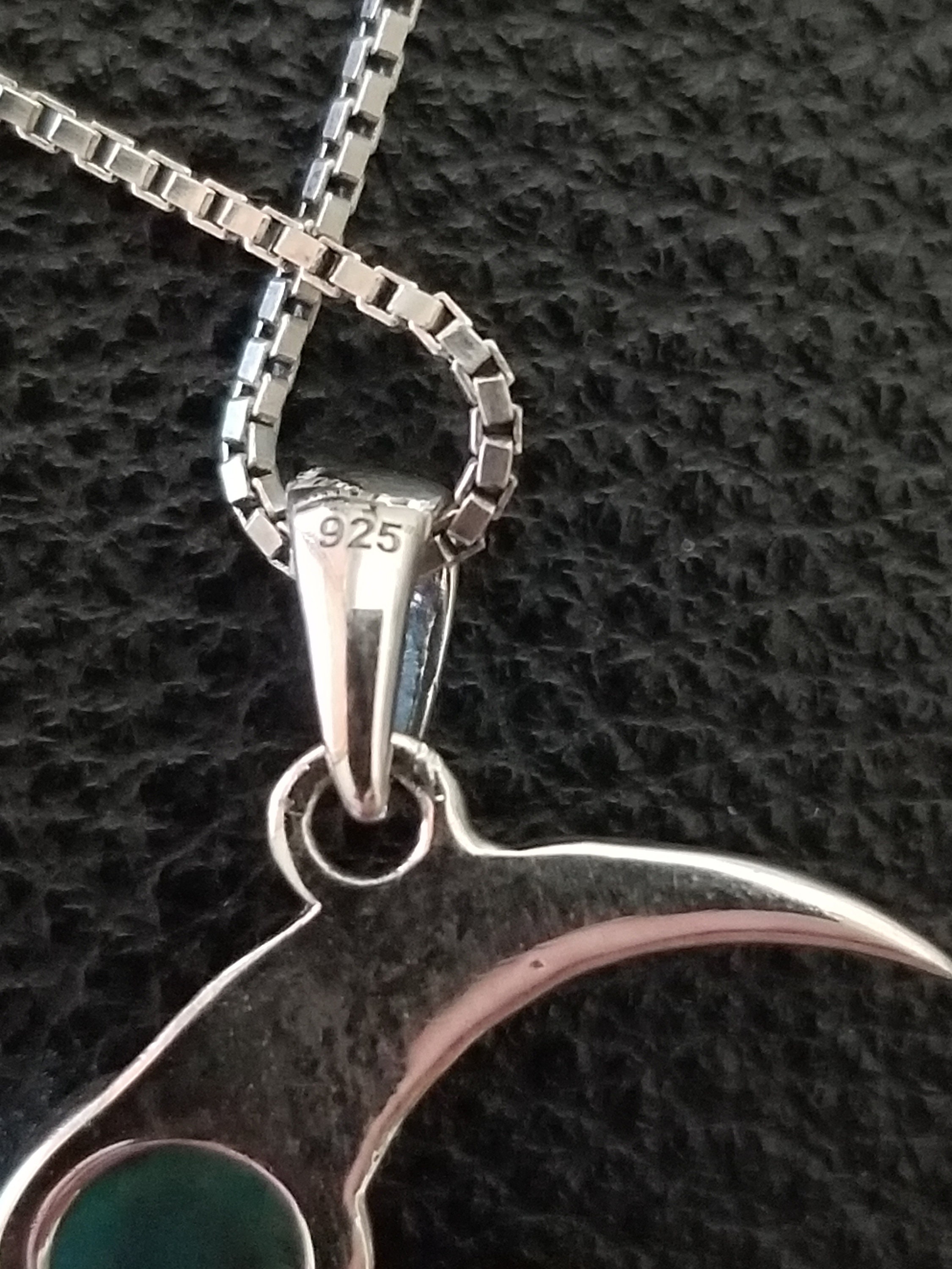 CP713 Wolf Howling at the Moon With Clear Stone in Sterling