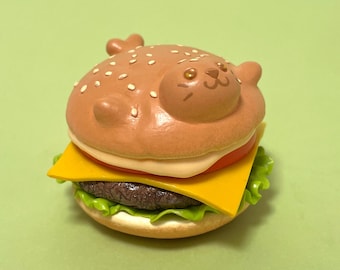 Sculpture de phoque cheeseburger, hamburger en pâte polymère, art de phoque original