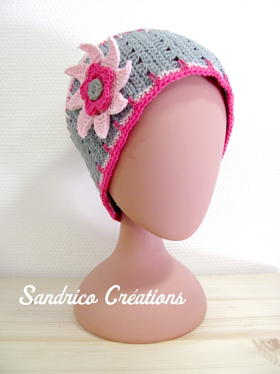 Hand-knitted crochet headband in brightly coloured cotton with multicolored discs