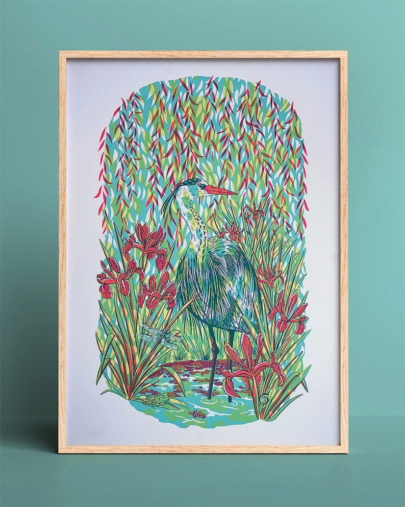 May include: A blue heron stands in a pond surrounded by green reeds and red irises. The background is a light blue with a pattern of green and red leaves.