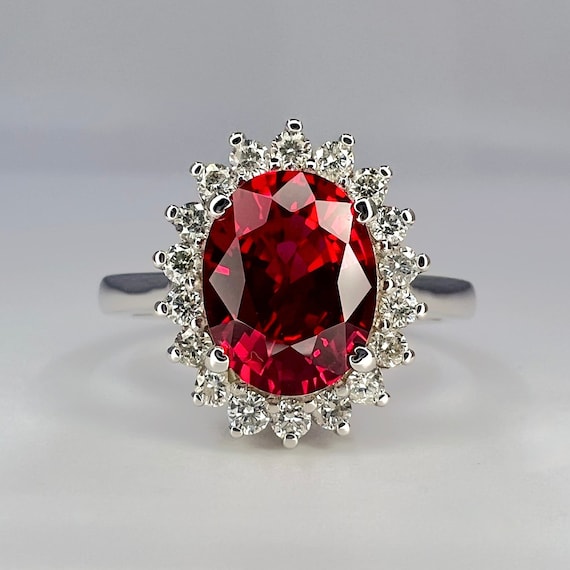 14k Yellow Gold Oval Created Ruby and Diamond Ring 14k Yellow Gold Oval Created Ruby and Diamond Ring