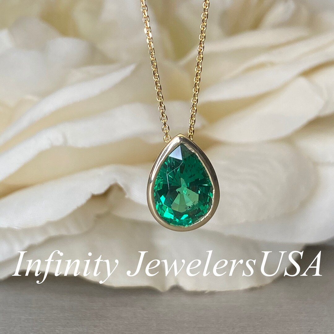 Bezel Set Pear Shape Emerald Pendant Necklace 14k Yellow Gold, May