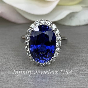 Elongated Oval Sapphire And Diamond Halo Style Engagement Wedding Anniversary Ladies Ring 14K White Gold #5656