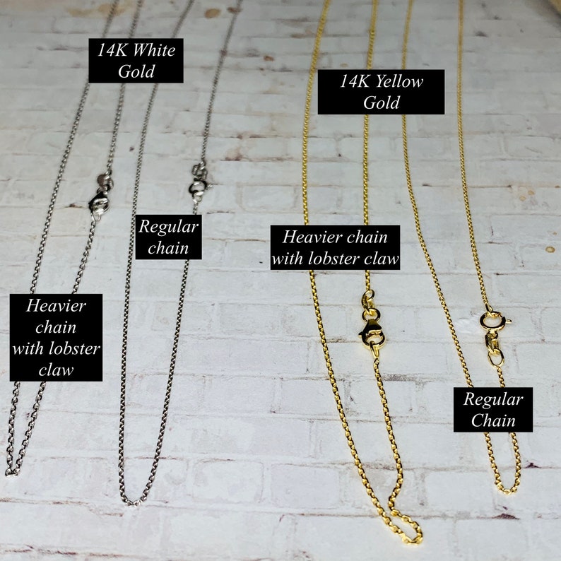May include: Four gold chains, two in 14K white gold and two in 14K yellow gold. Two chains are regular and two are heavier with lobster claw clasps.