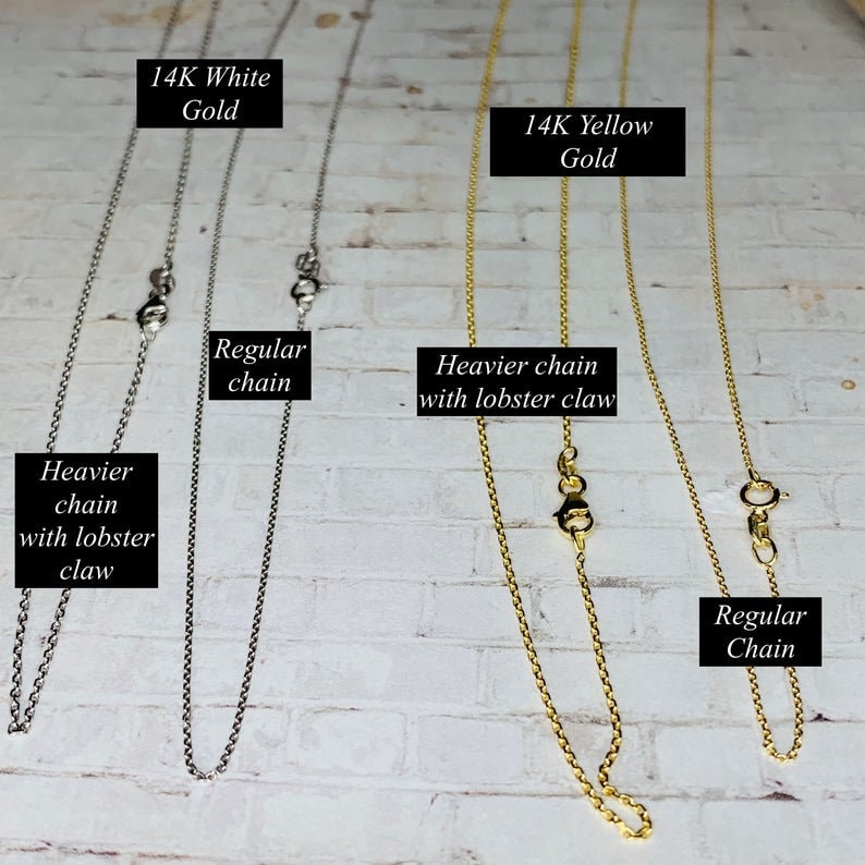 May include: Image of three gold necklaces. The first two are 14K white gold, one with a heavier chain and lobster claw clasp, the other with a regular chain. The third is 14K yellow gold with a heavier chain and lobster claw clasp, and a regular chain.