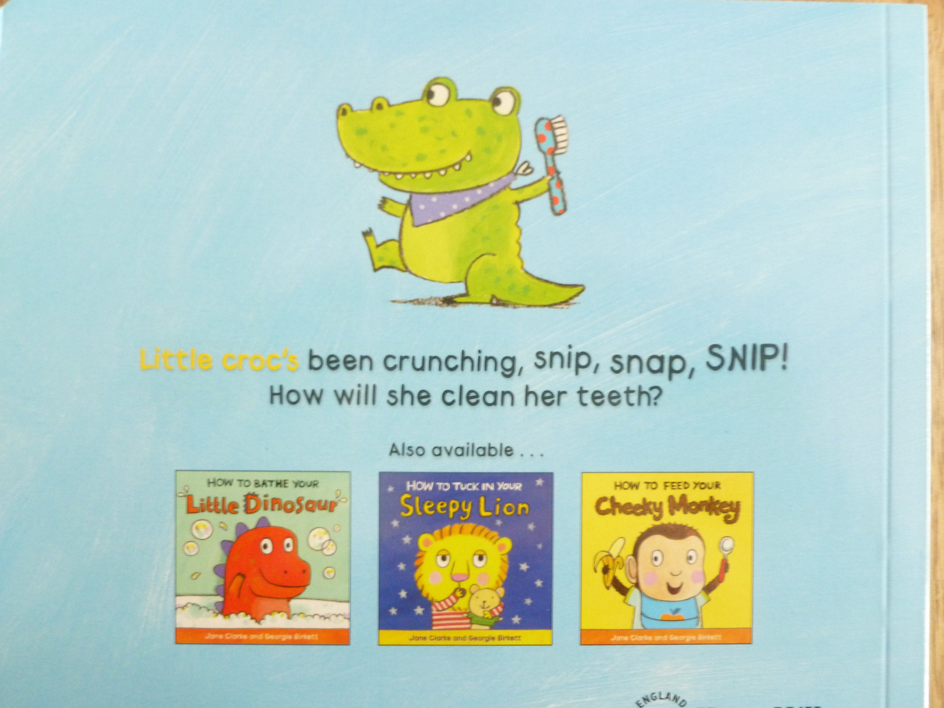 How to Brush Your Teeth With Snappy Croc board Book by Usborne Books