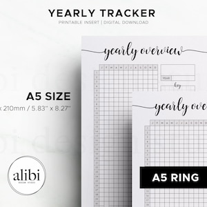 May include: A5 size yearly tracker printable insert with the text "YEARLY TRACKER" and "yearly overview". The insert measures 5.83" x 8.27" and includes a grid for tracking. The design is minimalist with a handwritten font.