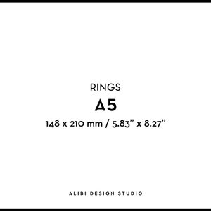 May include: White background with black text. The text reads "RINGS A5" with dimensions of 148 x 210 mm / 5.83" x 8.27". The bottom of the image has the text "ALIBI DESIGN STUDIO".
