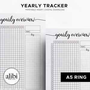 May include: Two black and white printable yearly tracker inserts. The top of the page reads "YEARLY TRACKER" and "yearly overview" in script. The tracker includes a grid for each day of the month and a key section. The bottom left corner has the "alibi" logo. The right side has "A5 RING".