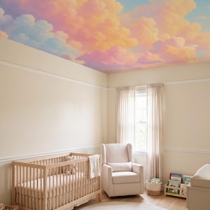 May include: A nursery room featuring a ceiling mural of fluffy clouds in shades of pink, orange, and blue. The room includes a light wood crib, a beige upholstered armchair, a round woven rug, and a small wooden bookshelf with books.