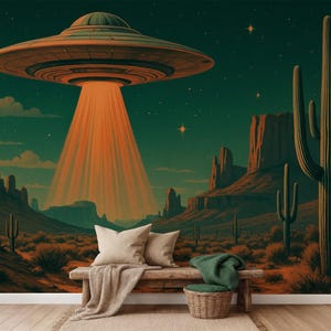 May include: A retro-style mural depicts a desert landscape under a starry sky. A vintage UFO emits a bright orange beam of light. The scene includes cacti, mesas, and a wooden bench with pillows and a blanket.