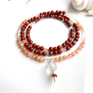 Mala made of red jasper, sunstone (A), rock crystal and silver, final bead rock crystal; prayer beads - energy, joy and clarity