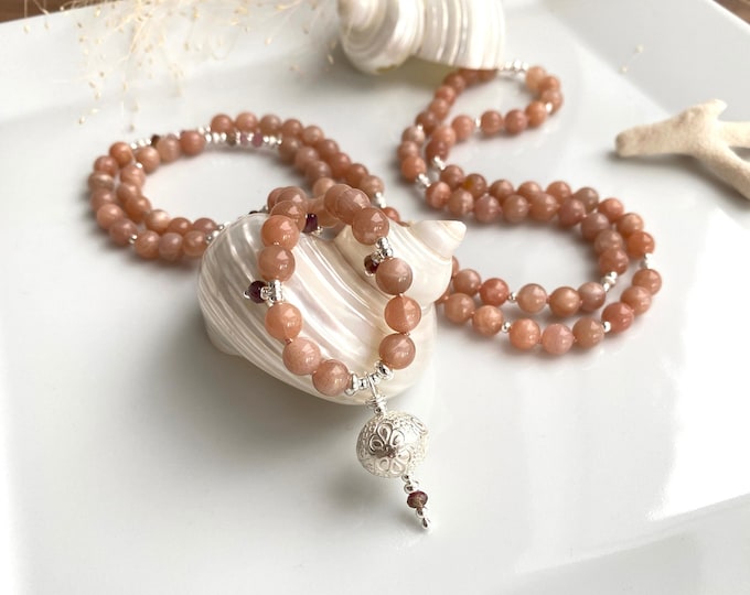 Mala necklace made of orange moonstone, decorated with sterling silver and tourmaline, final bead made of hilltribe silver, noble prayer chain