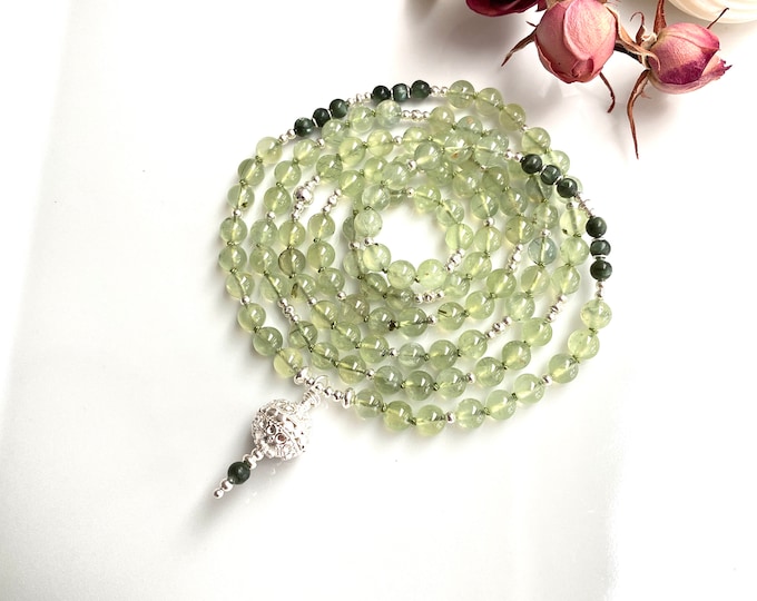 Mala necklace made of prehnite, decorated with seraphinite and silver, final bead with silver ornaments, exclusive prayer chain with 108 beads