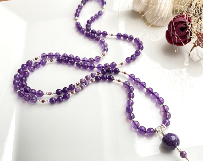 Mala made of charoite and dark amethyst, decorated with silver and violet garnet, final bead charoite, prayer beads