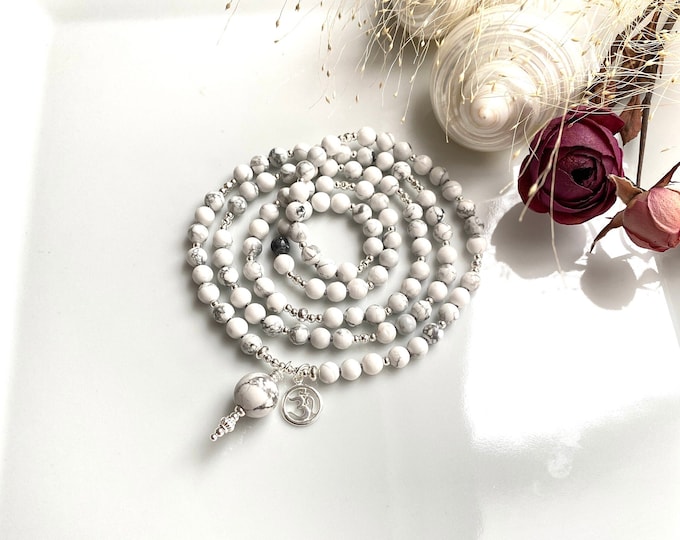 Mala necklace made of magnesite, decorated with silver, final bead magnesite and OM symbol