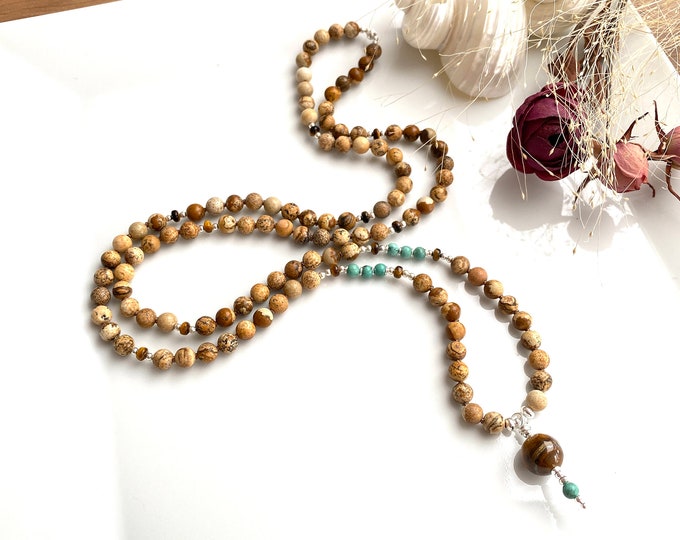 Mala made of landscape jasper and turquoise, decorated with silver, final bead made of tiger eye and turquoise, necklace in natural colours