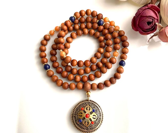 Sandalwood mala, 8 mm, sodalite and red calcite, gold-plated with silver and brass pendant with OM and double dorje, yoga jewelry