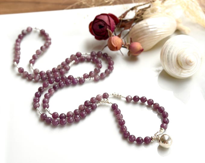 Mala necklace made of lepidolite, decorated with silver and quartz inclusions, silver bell bead at the end, yoga jewelry with 108 beads