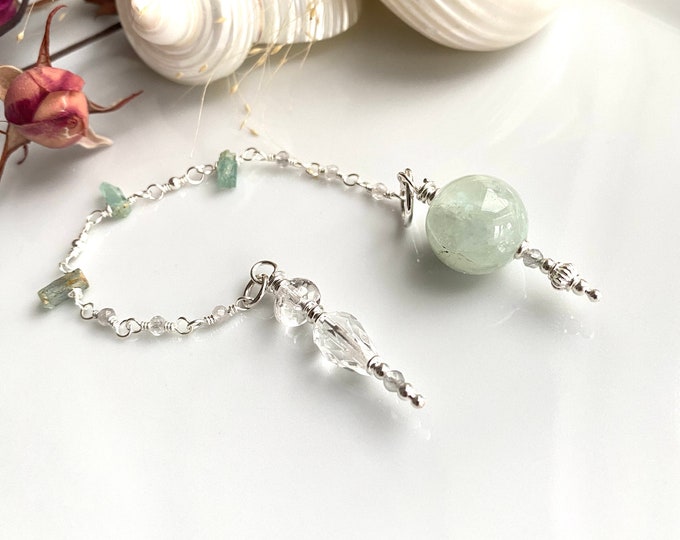 Pendulum made of aquamarine and silver with aquamarine raw crystals, rock crystal and included quartz, dowsing