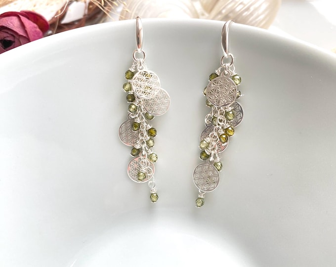 For K.: Drop earrings with the Flower of Life design in silver and green zircon
