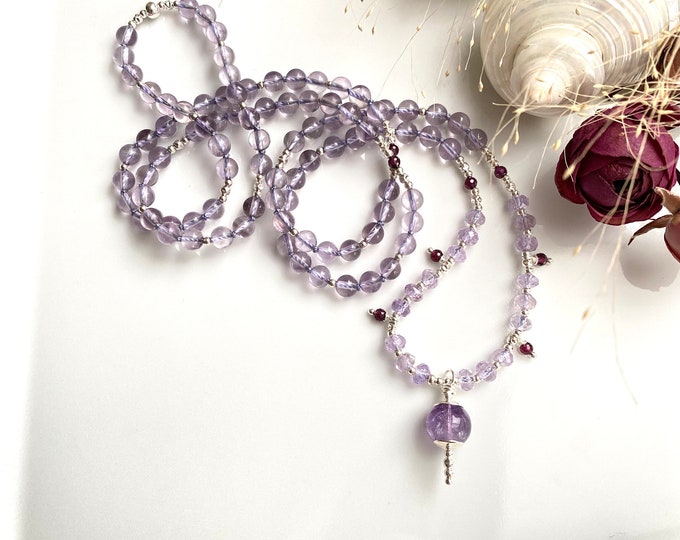 Mala made of bright amethyst and ametrine, decorated with silver and purple garnet, amethyst final bead, begging chain