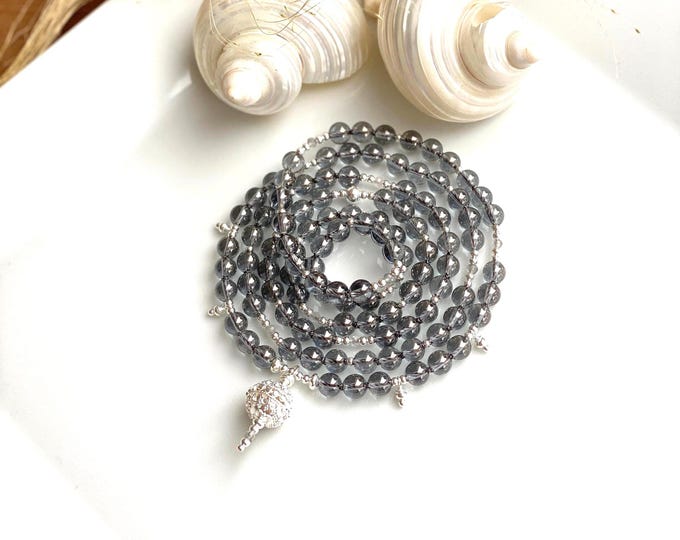 Silver Aura Quartz Mala Necklace, decorated with sterling silver, end bead with sterling silver ornaments, shimmering prayer beads