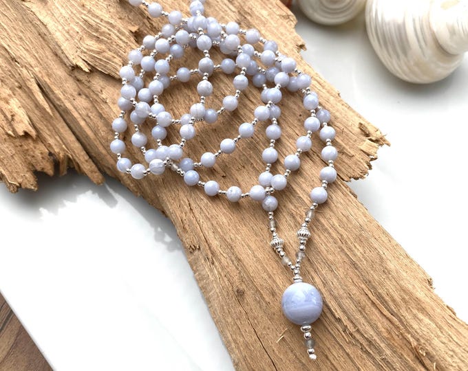 Delicate blue chalcedony mala, decorated with silver, long chain of chakra crystals with pendant, yoga jewelry