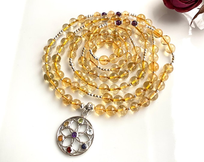 6 mm citrine mala, adorned with amethyst, prayer beads with a silver pendant featuring chakra crystals and the seed of life, yoga jewelry