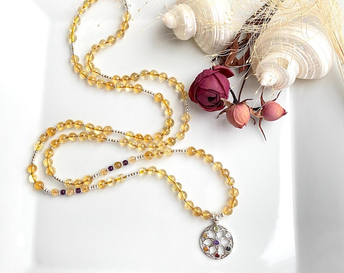 Mala made of citrine, decorated with amethyst, prayer beads with silver pendant with chakra crystals and the seed of life, yoga jewelry