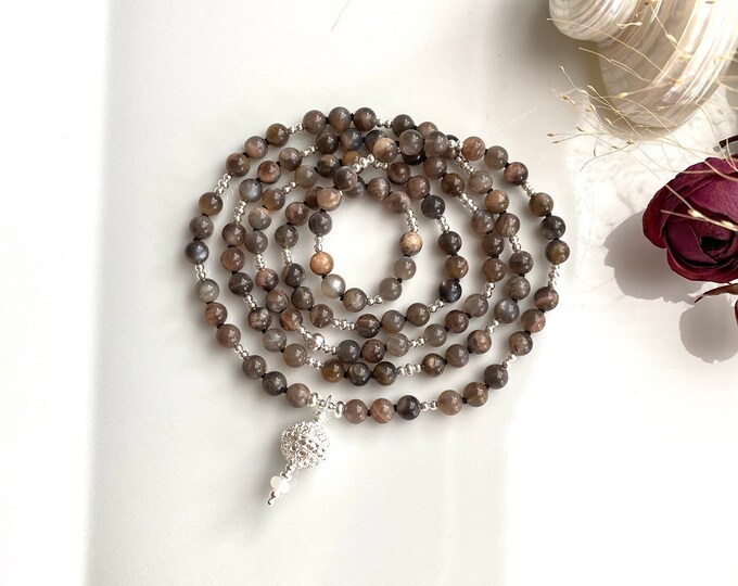 Mala made of dark moonstone, decorated with silver sterling, final bead with ornaments made of silver sterling, prayer beads