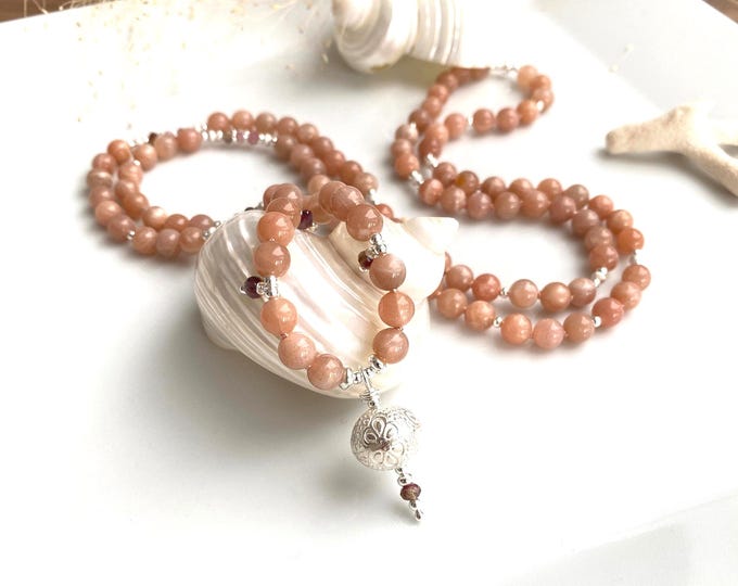 Mala necklace made of orange moonstone, decorated with sterling silver and tourmaline, end bead made of Hilltribe silver, precious prayer beads