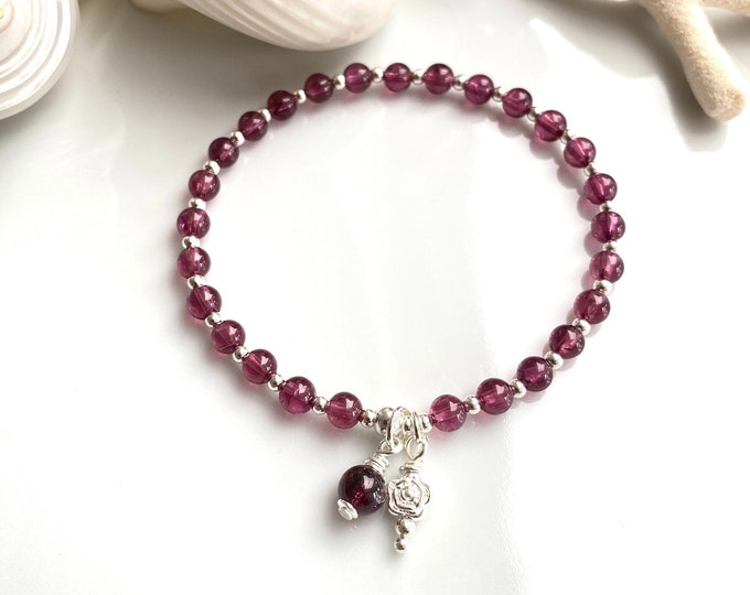 Mini mala made of garnet (A) decorated with silver, final bead of garnet and pendant with small rose, bracelet, prayer beads