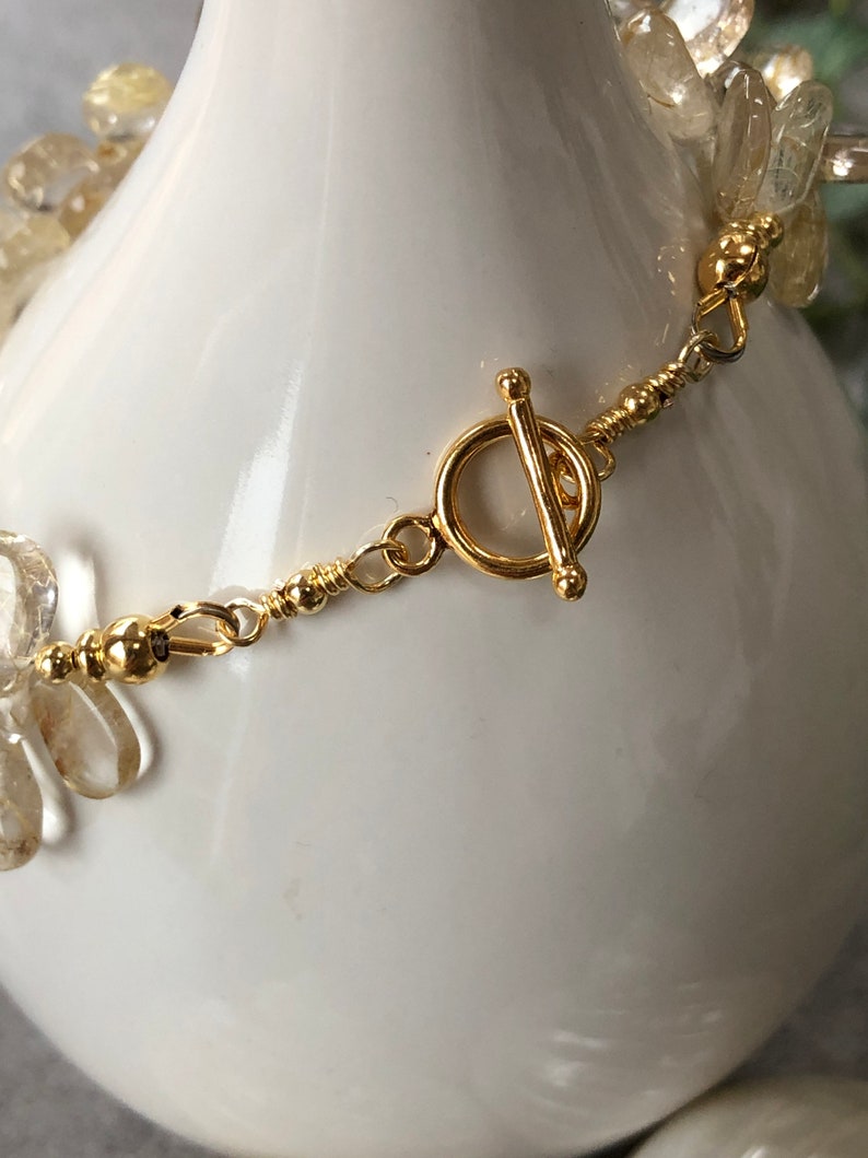 Bracelet in ruler quartz clear with silver gold plated