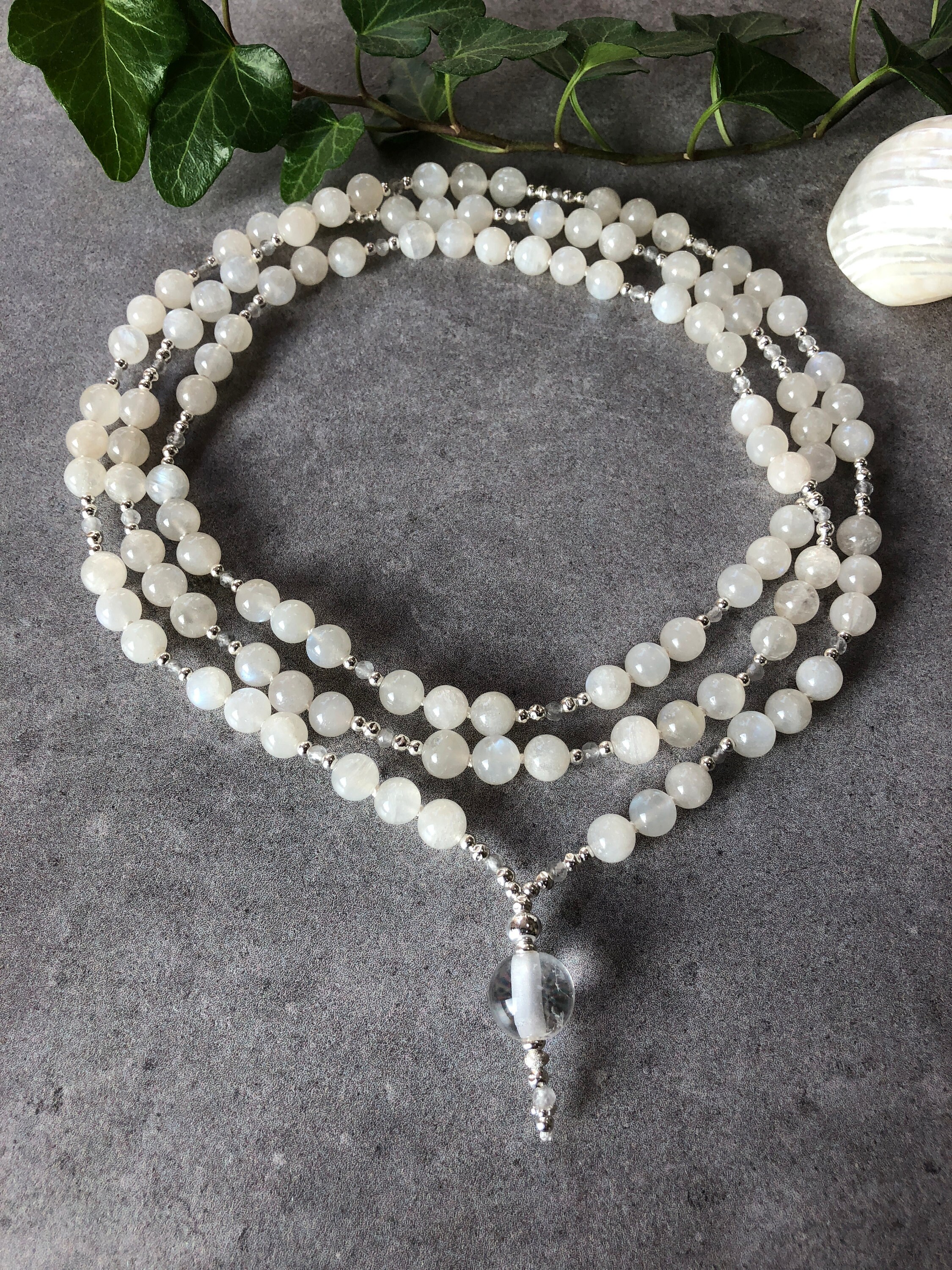 Mala of 108 pearls of Moonstone white, decorated with inkling quartz