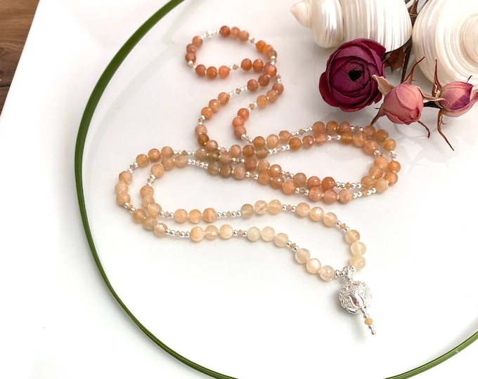 Mala made of faceted moonstone, decorated with sterling silver, end bead with sterling silver ornaments, prayer beads, yoga jewelry