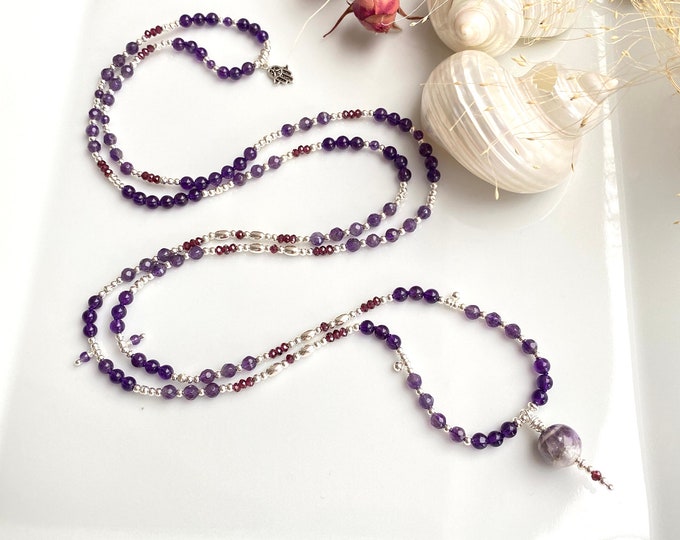 Magical mala made of amethyst, decorated with garnet and silver, final bead chevron amethyst, delicate prayer chain full of magic