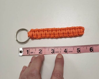 Orange paracord keychain, 4 1/2 inches long