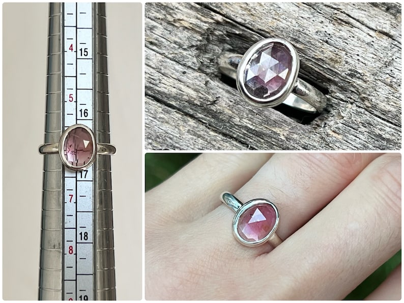 May include: A silver ring with a pink oval-shaped gemstone set in a bezel setting. The ring is shown on a finger and on a ring sizer.