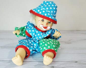 small but knowing clown doll