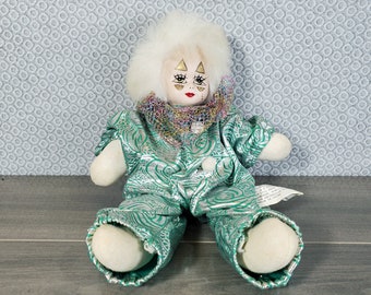 small but knowing clown doll
