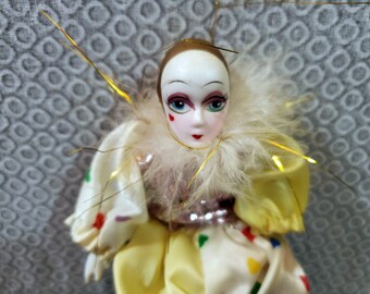 small but knowing clown doll