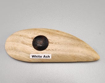 Costilla de cerámica blanca de ceniza con forma de media lágrima