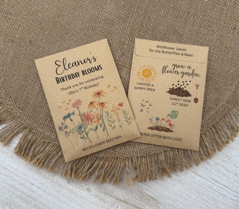 May include: Two brown seed packets with floral illustrations and text. One reads "Eleanor's Birthday Blooms" and thanks the recipient for celebrating Ellie's 7th birthday. The other packet says "Wildflower Seeds for the Butterflies & Bees."