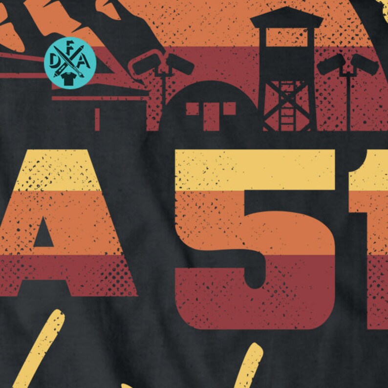 May include: A vintage-style graphic with the text "Area 51" in a retro font. The graphic features a sunset background with a silhouette of a building with a watchtower and a fence. The text is in a red, orange, and yellow color scheme.