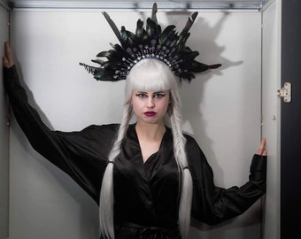 Posey. headdress, headpiece, feathers, goth, fetish, burlesque, drag, catwalk, model, photoshoot, fashion, halo, statement,