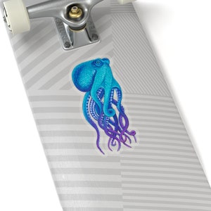 May include: A blue and purple octopus with tentacles curled up on a white and gray striped skateboard.